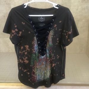 Short sleeve tee. Deep V neck cutout with lace up.